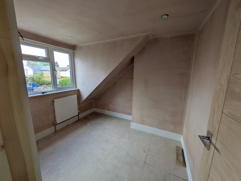 Girls bedroom before refurbishment in Addlestone showing the original décor prior to colour drenching and mural installation.